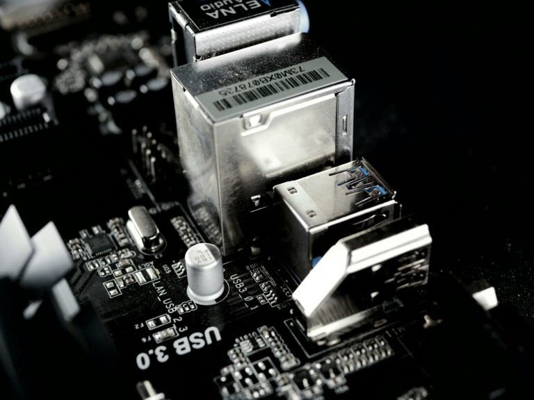 Detailed view of a circuit board featuring USB ports and electronic components.